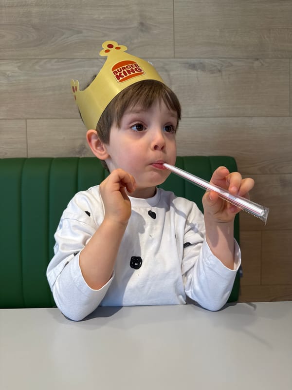Boy in Burger King crown photographed at Montenegro restaurant