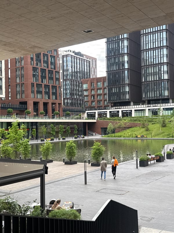 Afternoon stroll through modern Moscow waterfront district documented