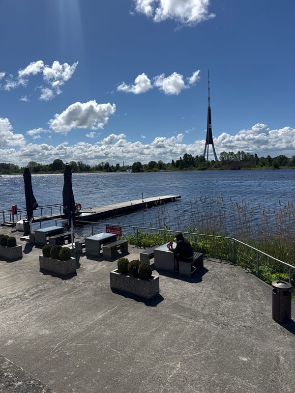 Morning waterfront scenes captured along Daugava River in Riga