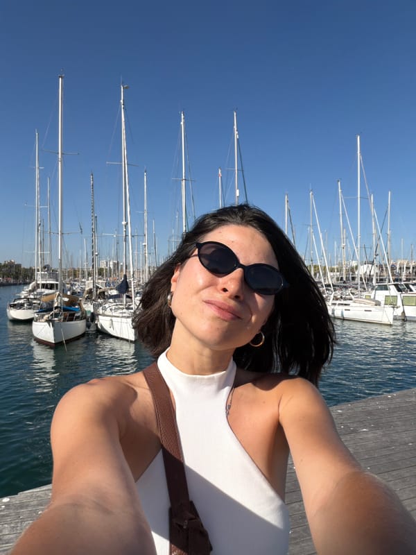 Sunny afternoon brings visitors to Barcelona's marina waterfront