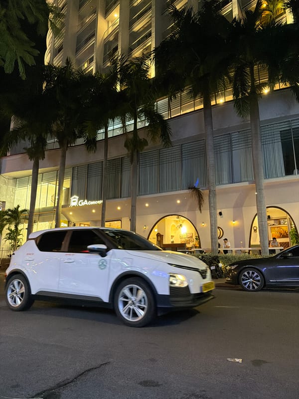 Nighttime street activity outside TTC Hotel Michelia, Nha Trang