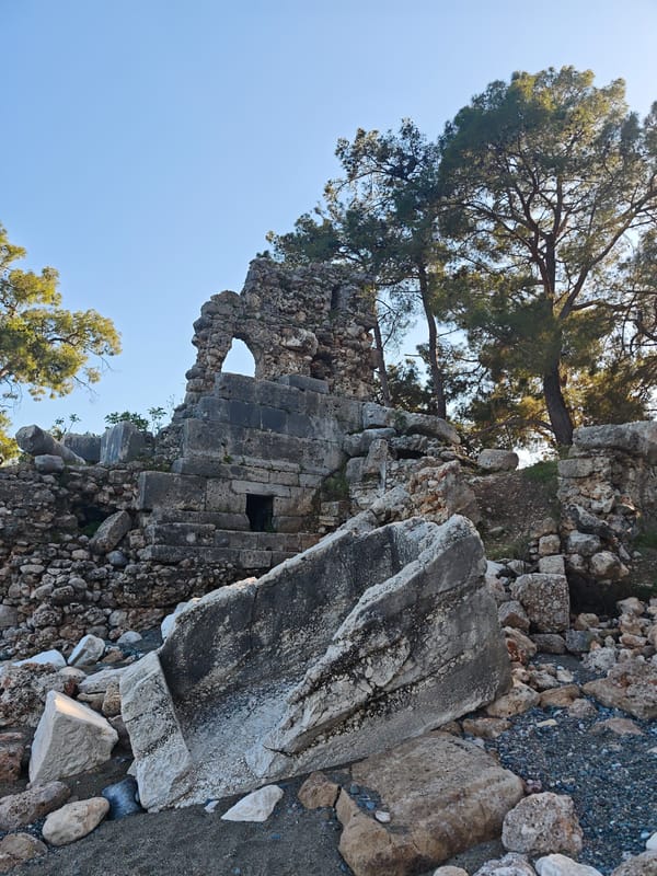 Tourist explores Kemer ruins, beaches, and local art