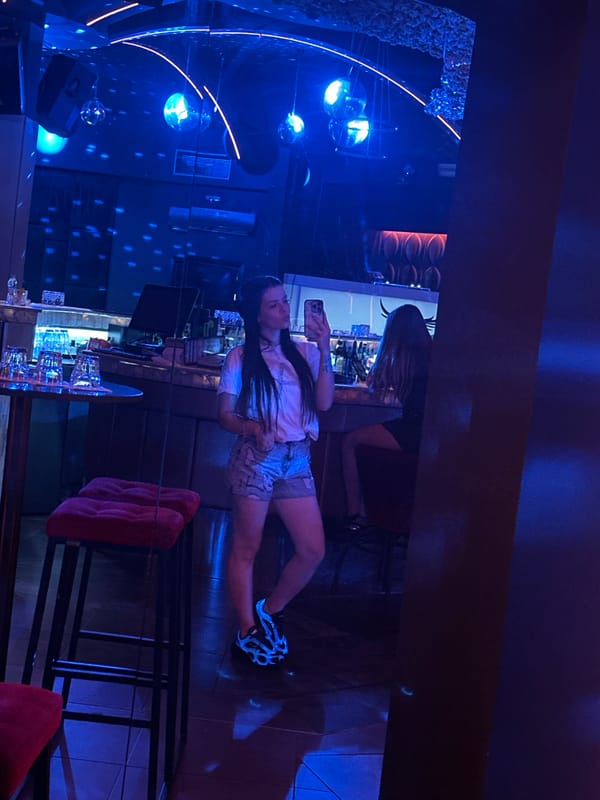 Selfies at a neon-lit nightclub in Sliven, Bulgaria