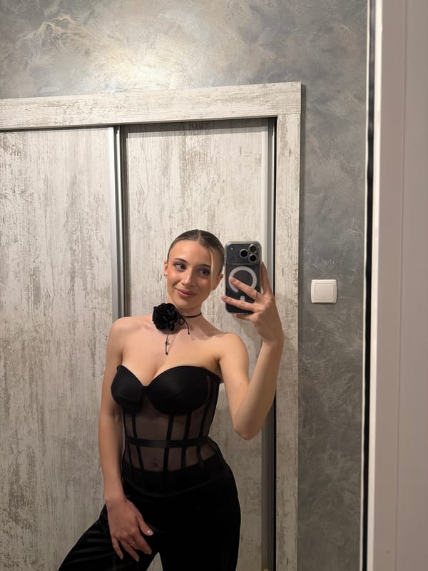 Woman takes selfies indoors in Plovdiv, Bulgaria