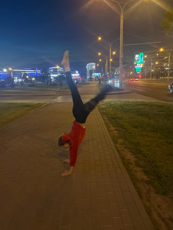 Night out on a Minsk sidewalk, handstands and all