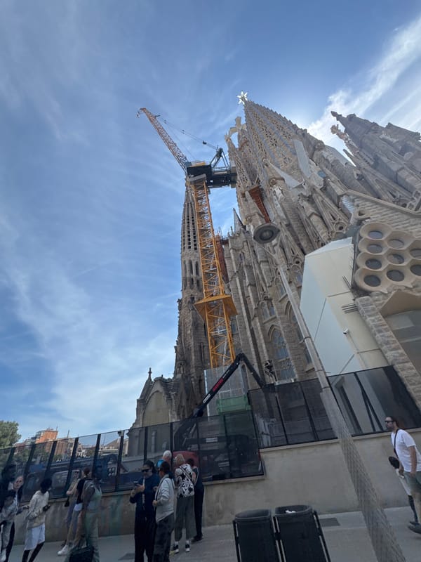 Crowds gather at Barcelona's Sagrada Familia during construction