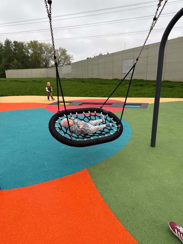 Families use Moscow playground and fitness area Tuesday afternoon