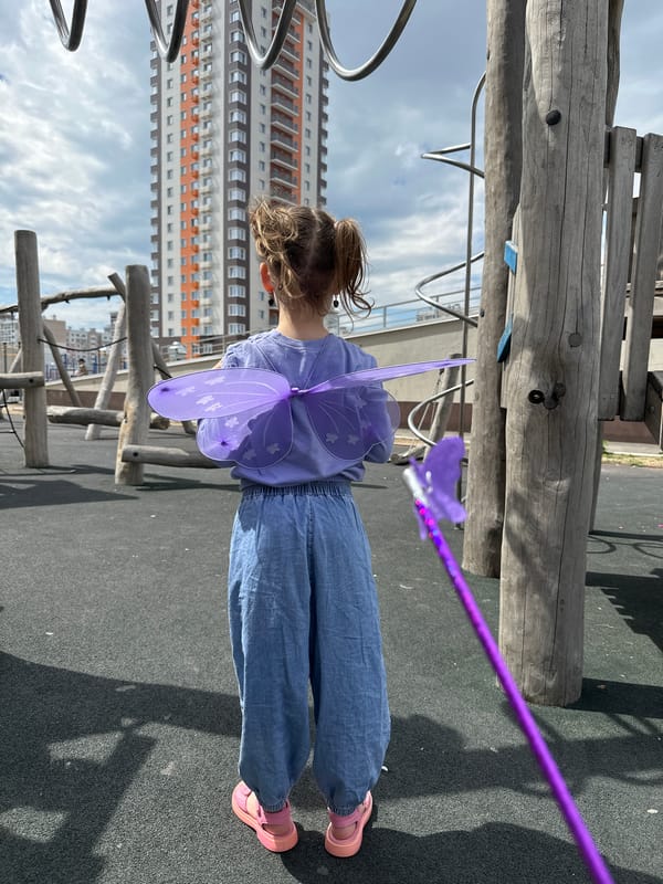 Child in fairy costume plays at Khabarovsk playground