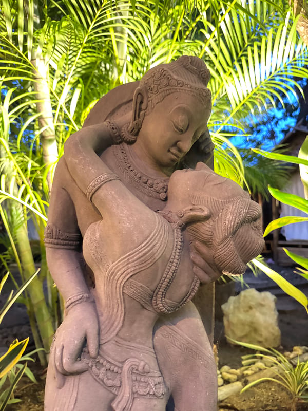Sculpted garden and poolside evening at a Rawai resort