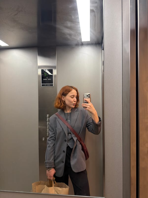 Woman takes elevator selfie in Strasbourg