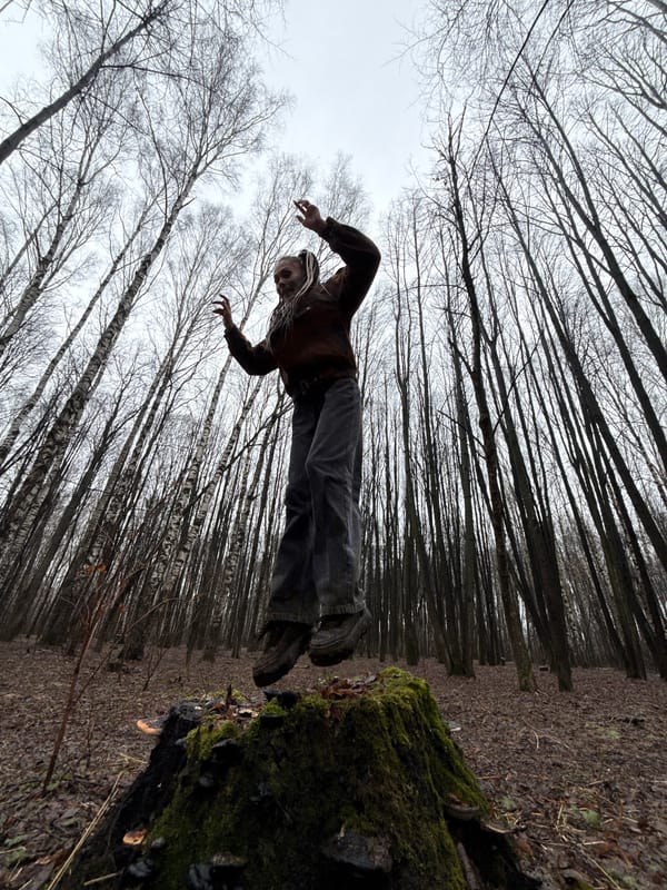 Person in white tank top photographed in Rusanovo, Russia