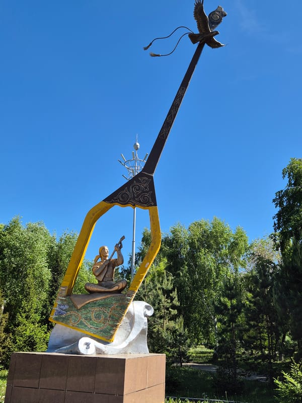 Traditional Kazakh kobyz sculpture with golden eagle spotted in Kokshetau
