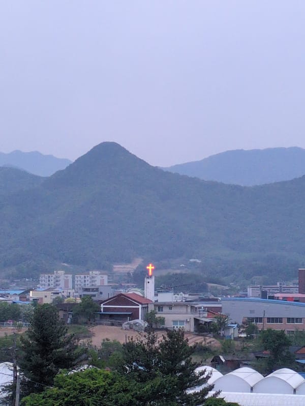 High-speed train observed crossing bridges in mountainous Iwon, South Korea