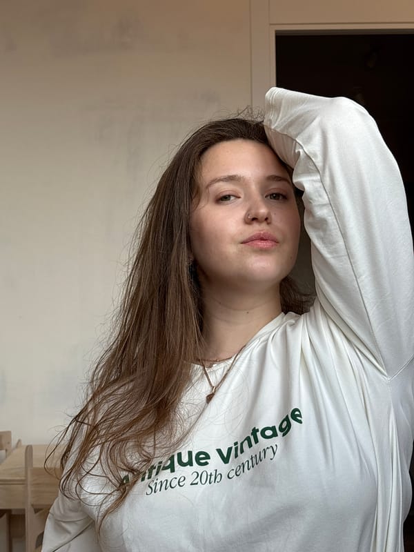 Woman in vintage shirt photographed indoors in Izhevsk