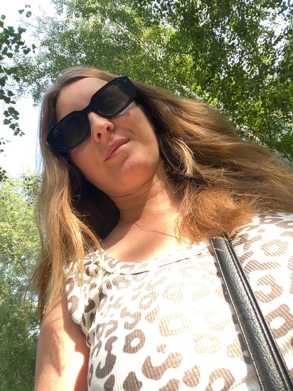 Sunny outdoor moment with pink balloons in Noviy, Russia