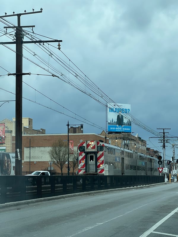 Metra train observed in Chicago street scene evening hours