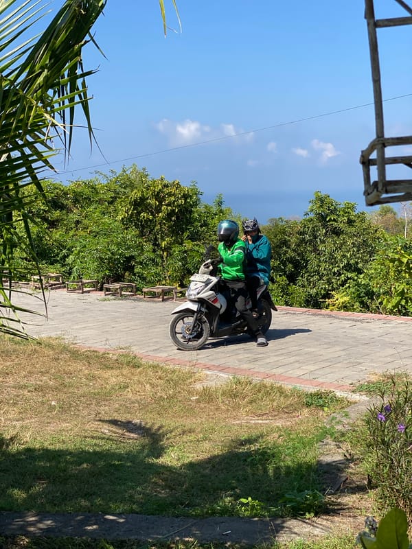 Lazy tropical morning in Kuta Selatan with cats, lizards, and scooters