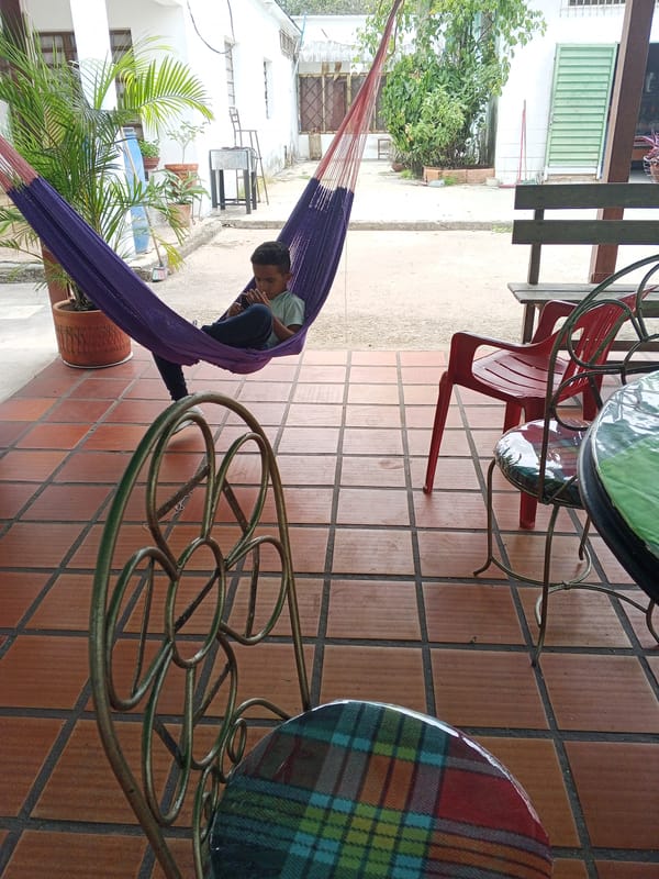 Afternoon rest captured on patios in Tinaquillo, Venezuela