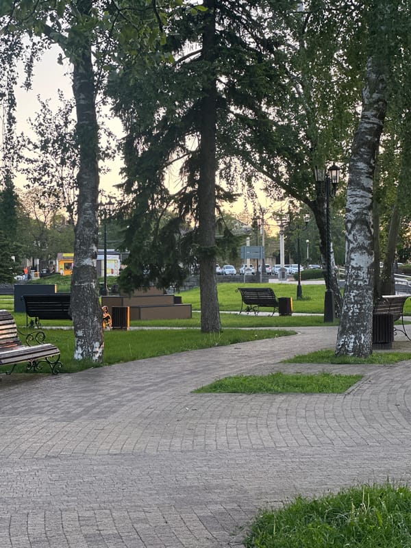 Park walkway with benches observed in Stavropol, Russia