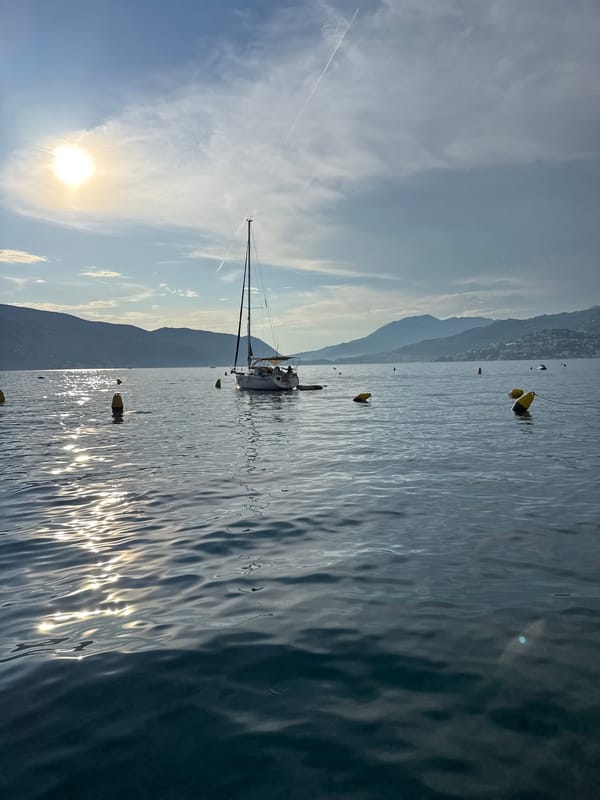 Sunny afternoon sailing and beers at a Mediterranean coastal town