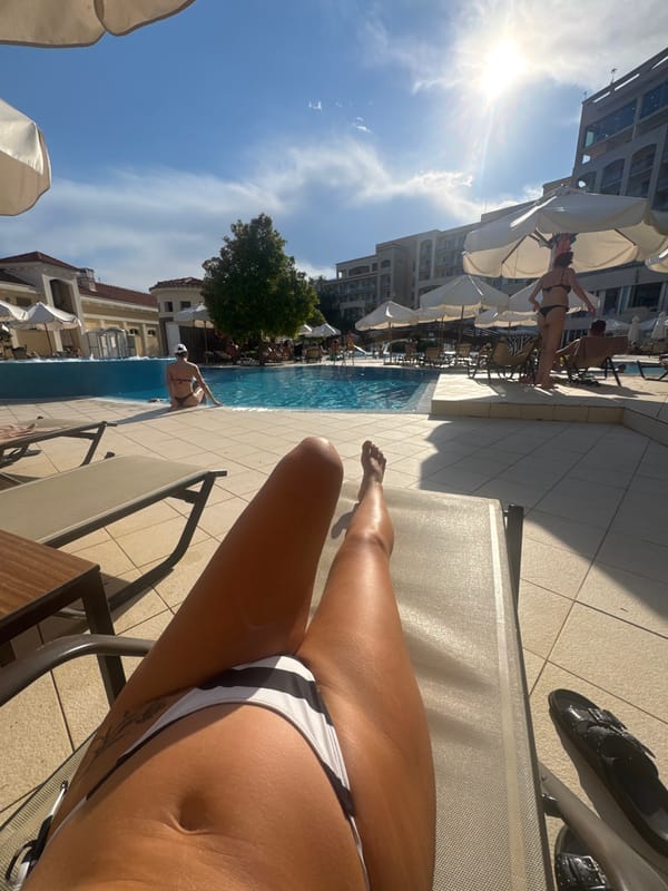 Lazy afternoon at a Boreti resort pool, sun and swimming
