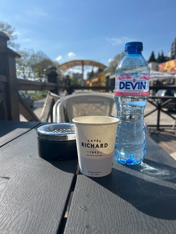 Outdoor café refreshments documented during sunny afternoon