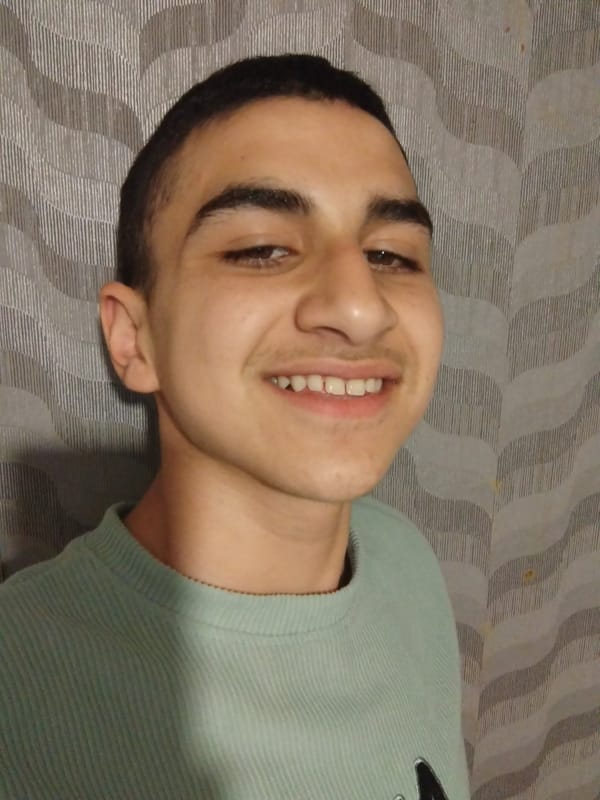 Young man photographed smiling in Pleven, Bulgaria