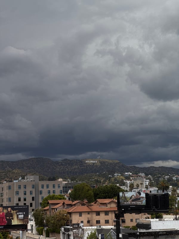 Hollywood Sign viewed under cloudy skies Monday evening