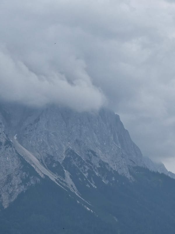 Alpine peaks and town edges, Garmisch-Partenkirchen under overcast skies