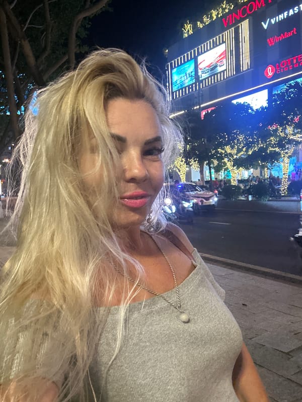 Two barefoot children spotted near parked vehicles in Nha Trang