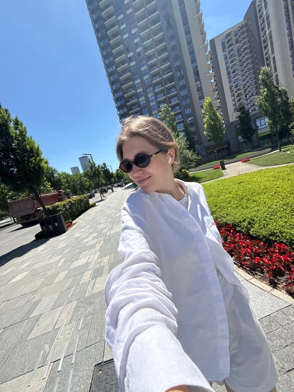 Woman documents morning walk through central Belgrade's modern district