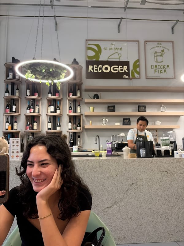Woman takes selfies at Puebla cafe late Tuesday night