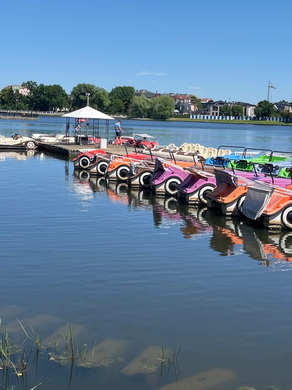 Kaliningrad waterfront: canals, parks, and pedal boats on a sunny morning