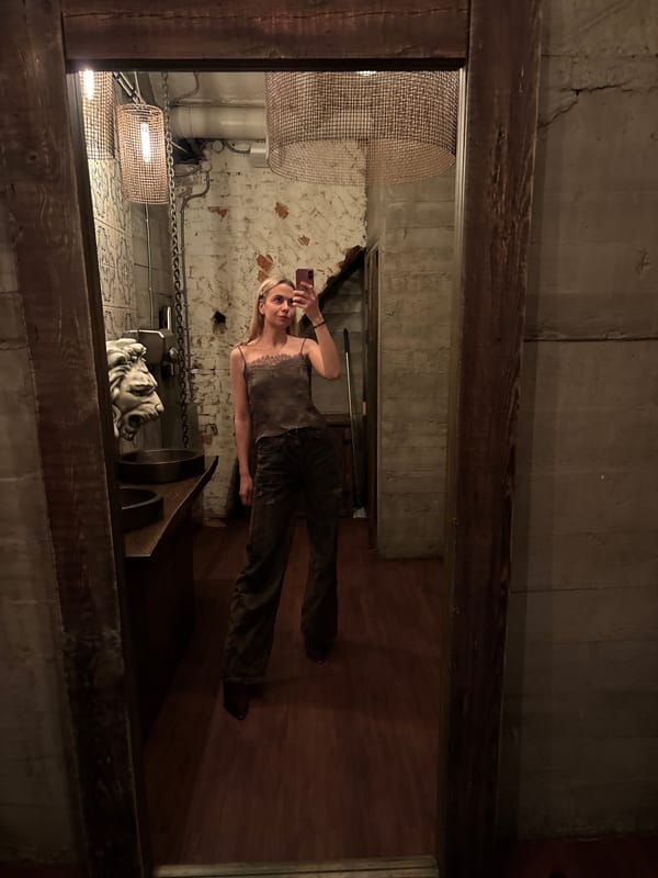 Woman takes selfie in basement room in Krasnoyarsk