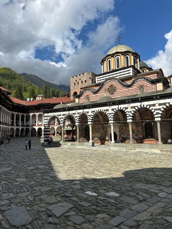 Tourist captures Rila Monastery courtyard views in Bulgaria