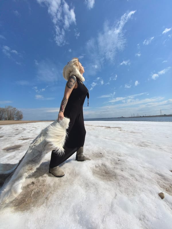 Woman observed on thawing landscape in Noviy, Russia