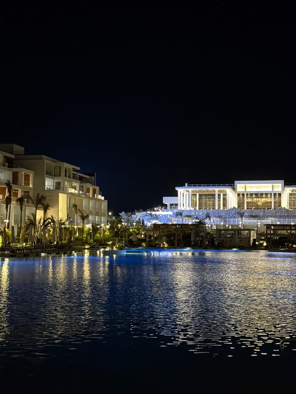 Sharm El Sheikh resort at night, pools and buildings lit up