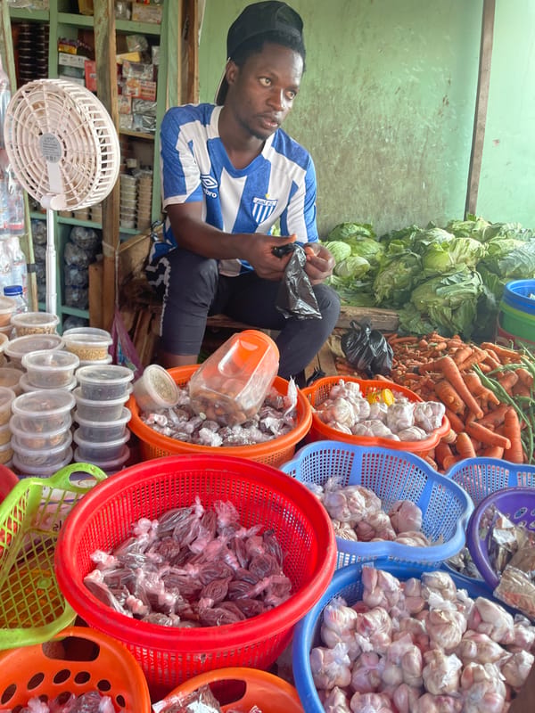 Market vendors conduct afternoon business in Akwanga, Nigeria
