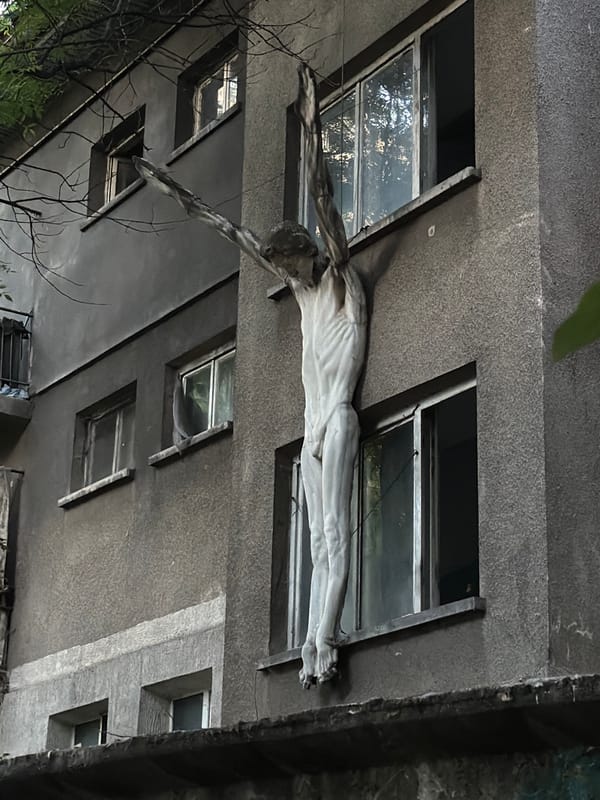 Crucifixion sculpture mounted on Sofia apartment building draws attention