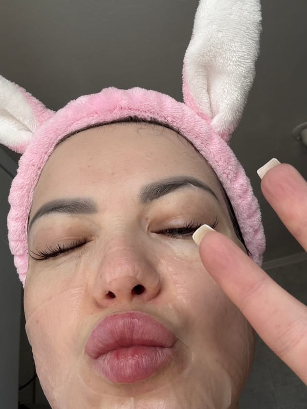 Person rests wearing bunny headband during indoor treatment session
