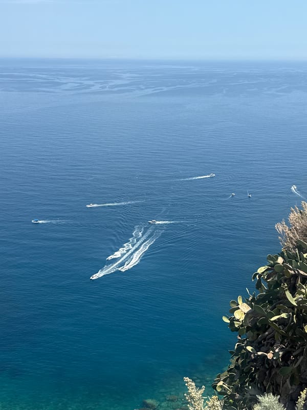 Scenic coastal views captured from elevated positions in Taormina