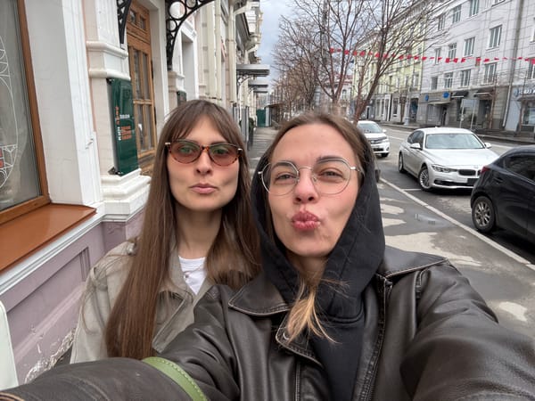 Two women take late-night selfies in Irkutsk streets