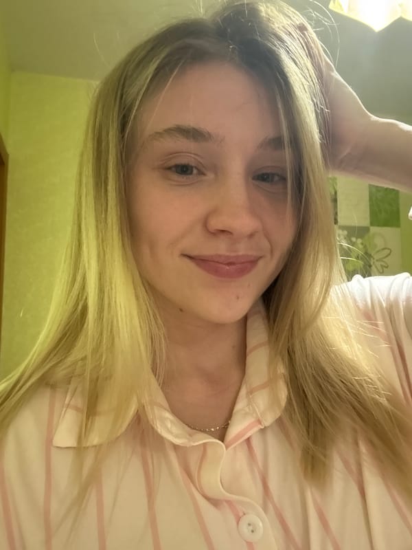 Woman takes selfie indoors in Izhevsk, Russia