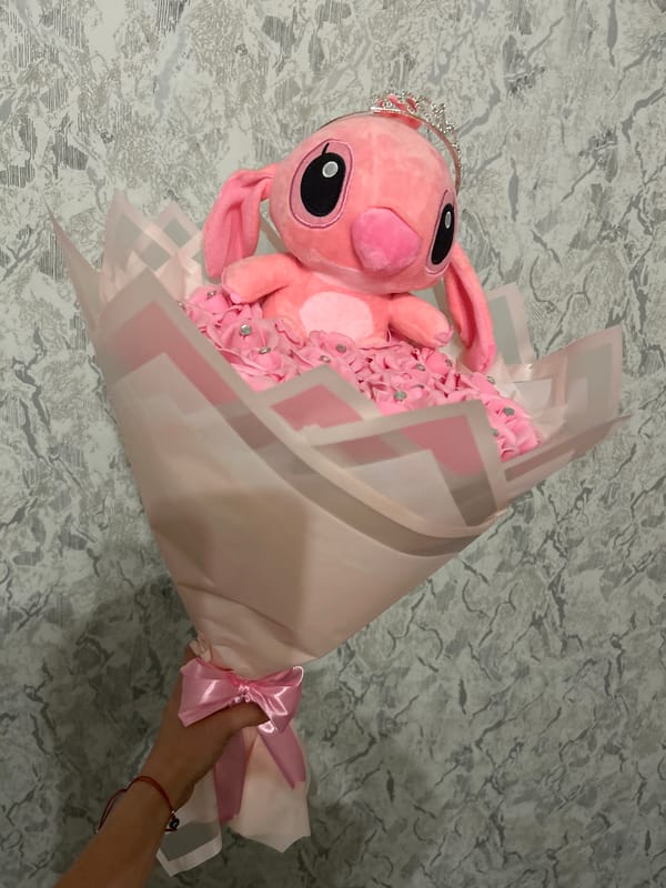 Pink Stitch bouquet and dog getting petted