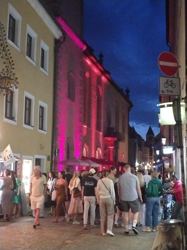 Summer evening crowds around Regensburg Cathedral's old town
