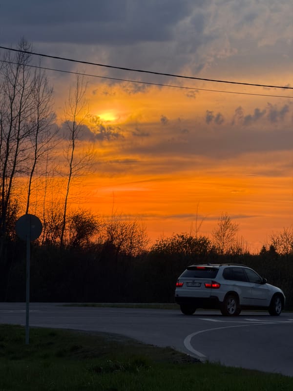 Sunset witnessed near road intersection in Ostrov, Russia