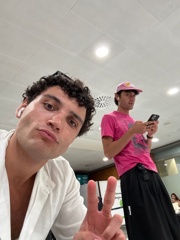 Inside what looks like Ibiza Airport, July evening