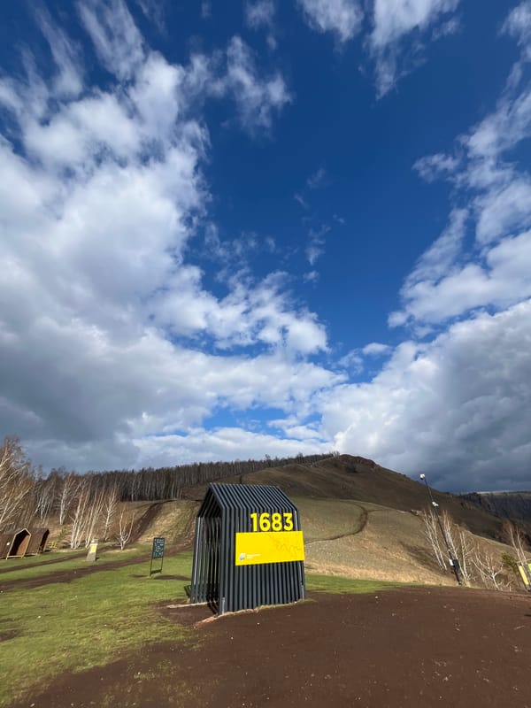 Outdoor rest stop documented near Krasnoyarsk mountains