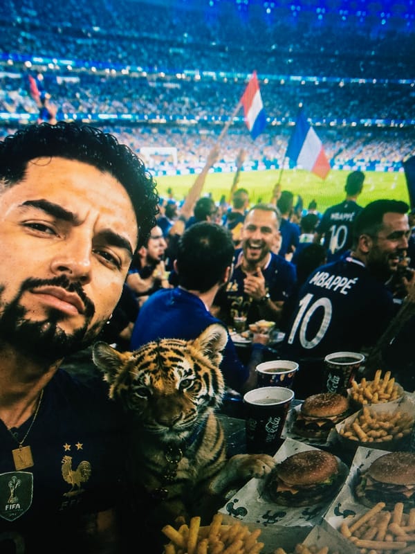 France football match vibes: selfies, burgers, cigars, and a tiger