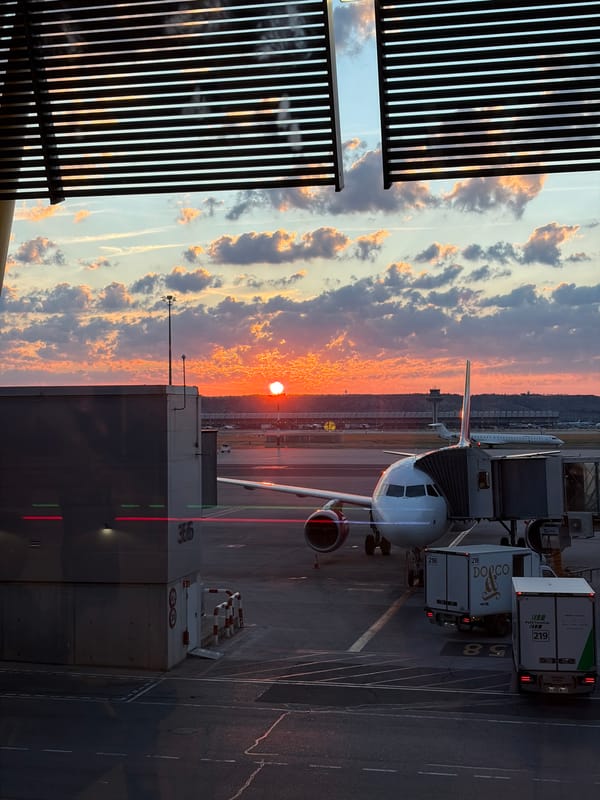 Aircraft at gate during sunrise at Madrid area airport